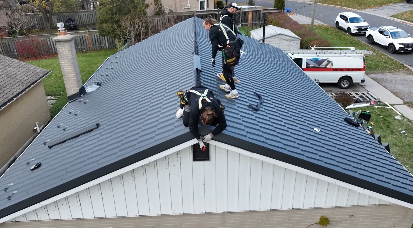 Professional roofing contractor team installing metal roof in Berwyn, IL
